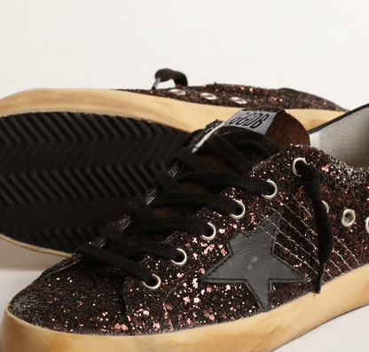 Super-Star in brown glitter with black leather star and heel tab